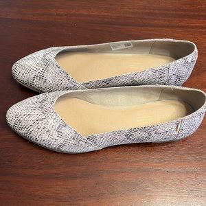 Tom’s snakesskin flats